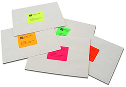 Fluorescent labels on mailing envelopes