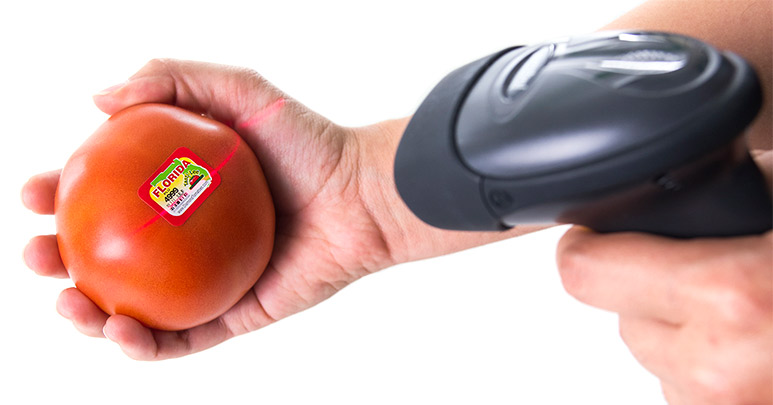 Tomato label with barcode being scanned